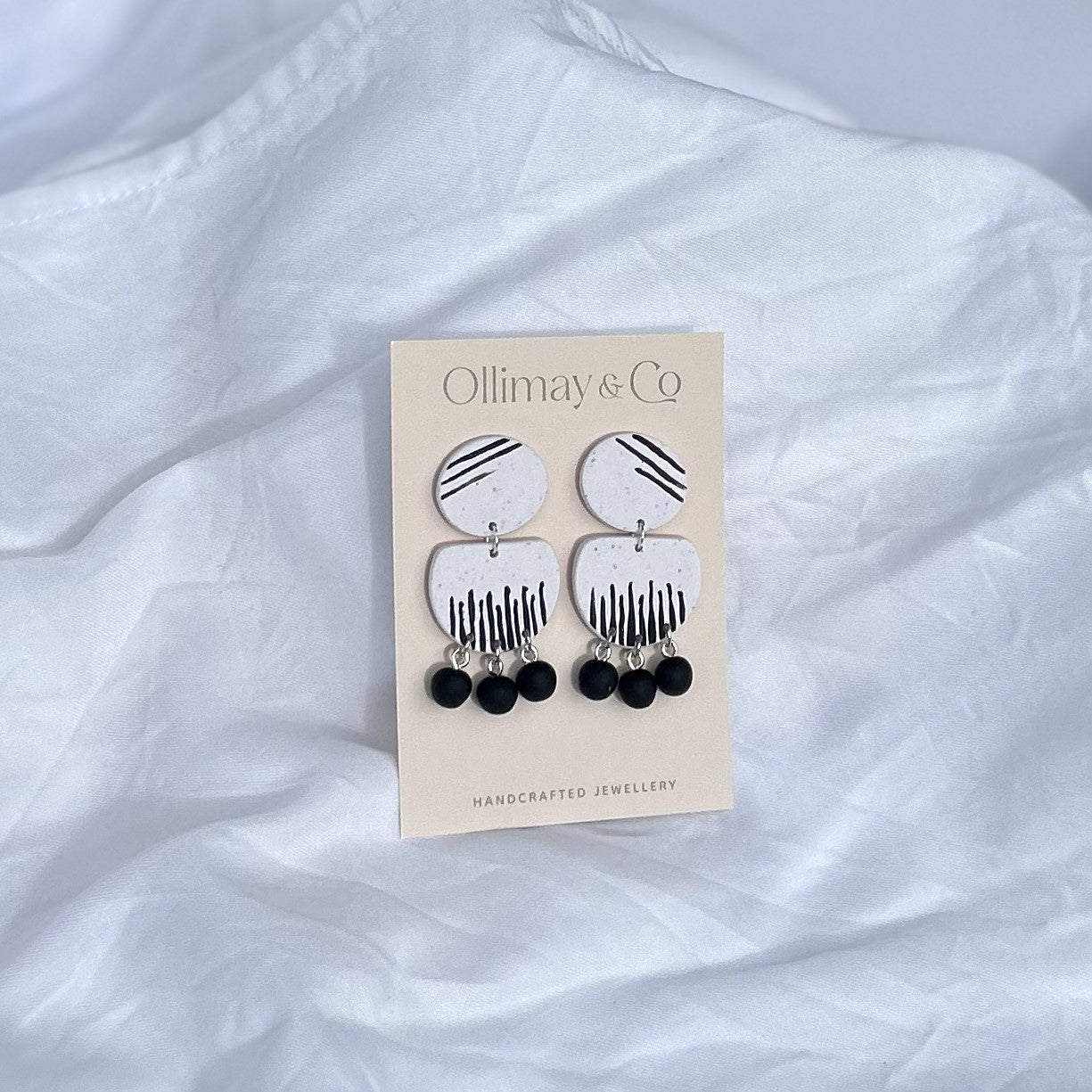Hand painted dangle black and white earrings - Ollimay and Co